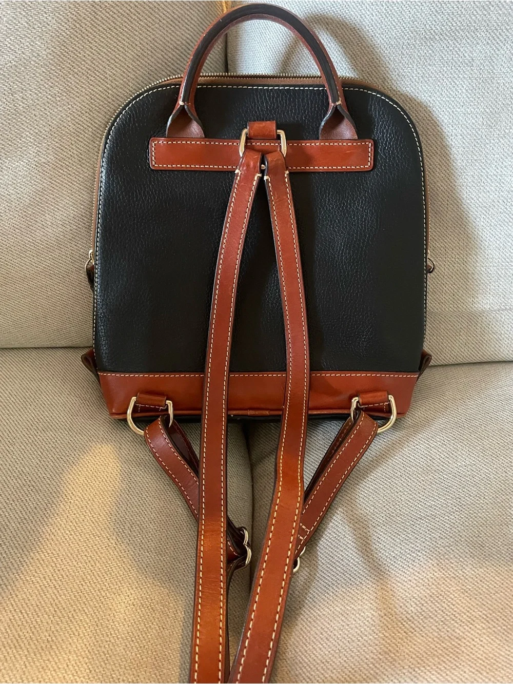 Dooney & Bourke Black with Brown Trim Leather Backpack